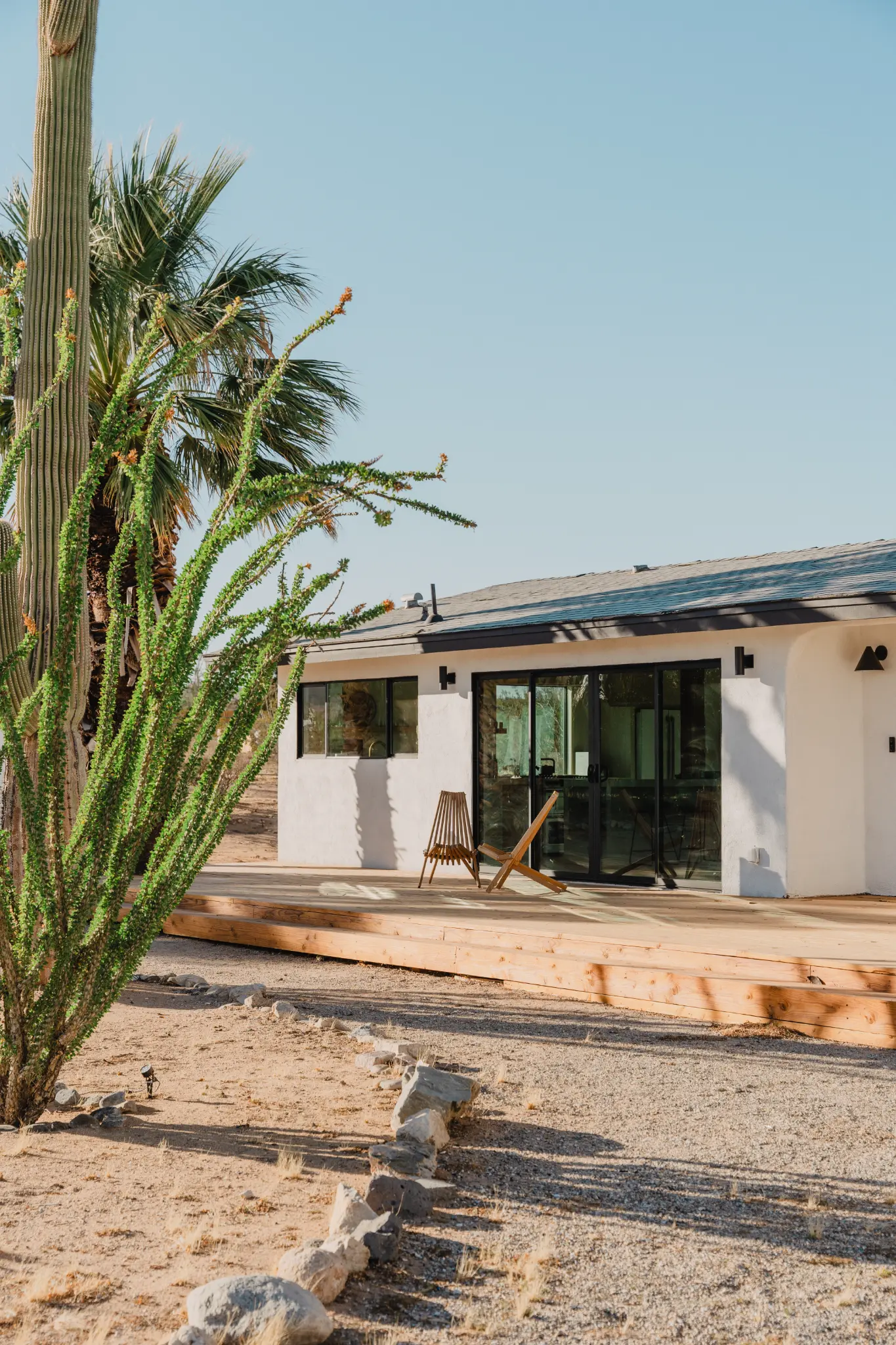 SaguaroHaus — dramatic exterior at dusk, desert sky