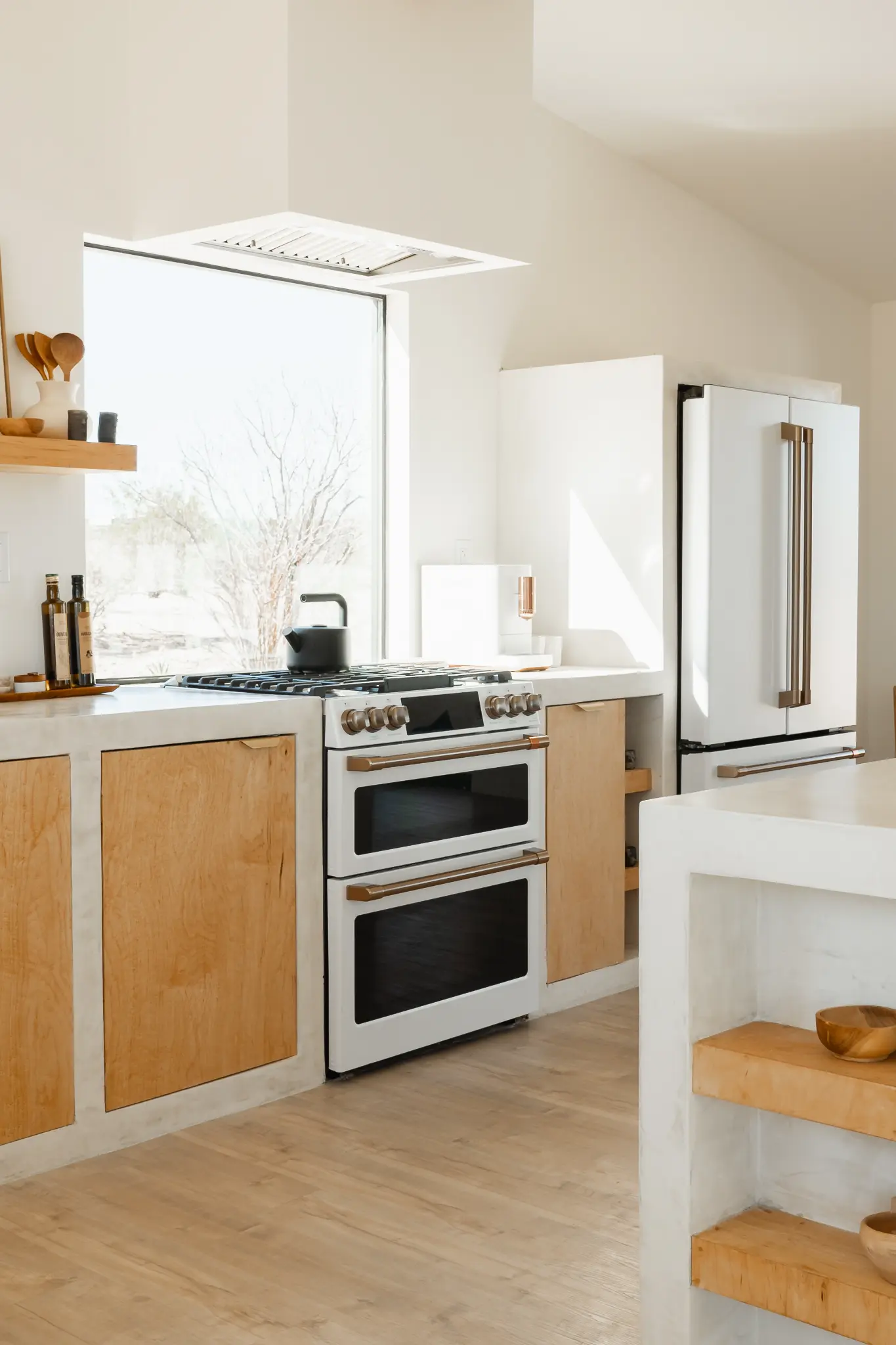 GE Café double gas range, matte white with bronze hardware